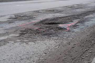 Image showing Big pothole on the road