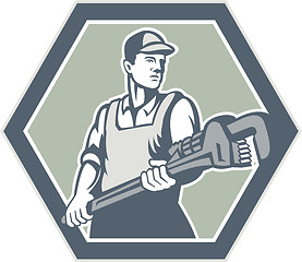 Image showing Plumber Holding Plumbing Wrench Retro