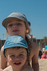 Image showing Brother and sister on the beach