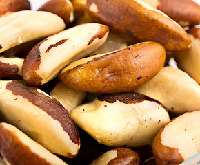 Image showing A close-up of Brazil nuts on a white background