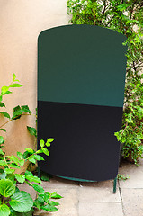 Image showing Chalkboard stand outside the restaurant