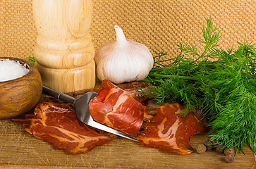 Image showing simple farm bacon, stranded on a fork