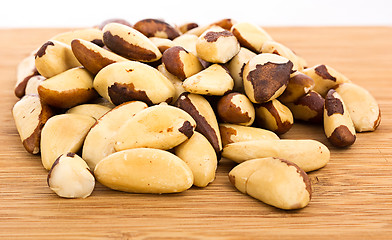 Image showing A close-up of Brazil nuts on a white background