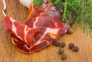 Image showing simple farm bacon, stranded on a fork