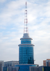 Image showing Modern building and communicate mast.