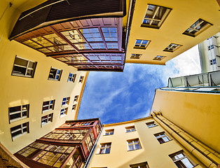 Image showing fisheye lens look of the Old Town on sky background . Prague