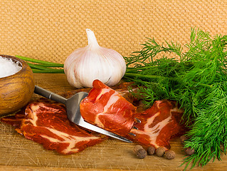 Image showing simple farm bacon, stranded on a fork