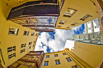 Image showing fisheye lens look of the Old Town on sky background . Prague