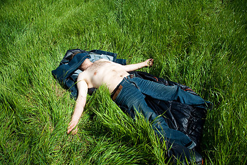 Image showing Man resting in grass