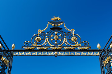 Image showing Detail of the gate against the blue sky