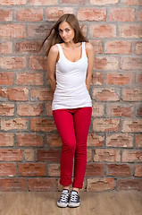 Image showing Shy girl casual design in red pants