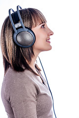 Image showing Pretty woman listening music