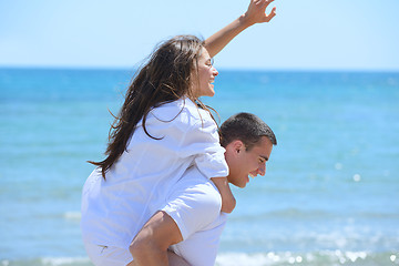 Image showing happy couple have fun on the beach