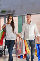 Image showing happy young couple in shopping