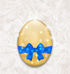 Image showing Easter glossy egg wrapping blue bow