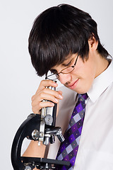 Image showing boy with microscope