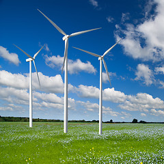 Image showing Wind generator turbine on spring landscape