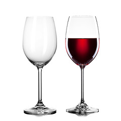 Image showing empty and full glass of wine isolated on white