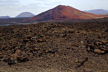 Image showing volcanic stone in los volcanes  rock  sky  hill and summer 