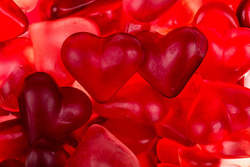 Image showing Brightly coloured red gums hearts