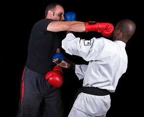 Image showing Kickboxing versus karate