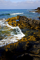 Image showing beach  light   foam rock spain  stone sky cloud   