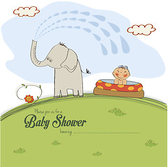 Image showing baby shower card with a small boy sprayed by an elephant