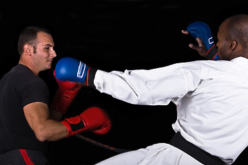 Image showing Kickboxing versus karate