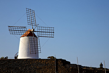 Image showing cactus windmills  lanzarote spain    the sky 