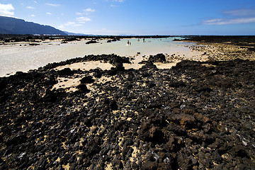 Image showing people spain  hill white  beach  spiral of black    lanzarote 