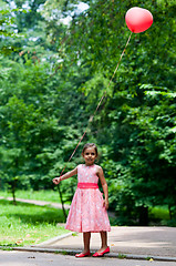 Image showing Little girl with balloon