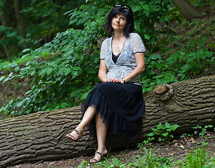 Image showing Portrait of attractive brunette in park