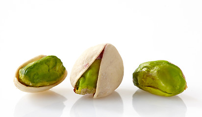 Image showing pistachios on a white background