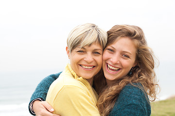 Image showing Happy mother and daughter looking at camera