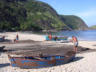 Image showing Fishermen on the beach