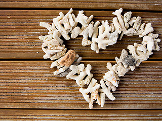 Image showing Heart symbol on wooden background