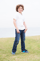 Image showing Young boy posing with hand in pocket