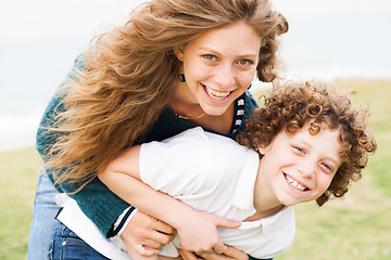 Image showing Loving mother and son playing