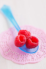 Image showing Three fresh raspberries