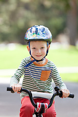 Image showing kid biking