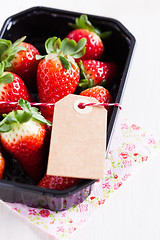 Image showing Fresh strawberries with tag