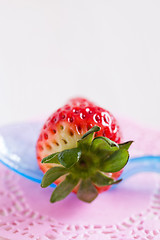 Image showing Fresh whole strawberry and spoon