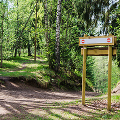 Image showing Wooden sign board on the natural trail. In the 
 forest park