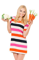 Image showing Woman with cabbage and carrots