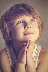 Image showing boy at prayer