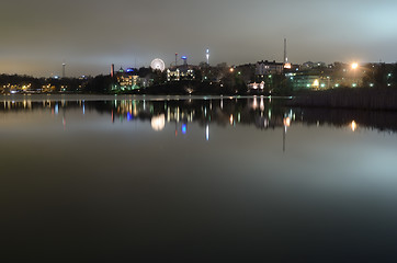 Image showing night Helsinki, the reflection in the water, Finland