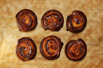 Image showing six buns on paper with Grunge Filter