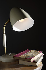 Image showing vintage table lamp and a few books