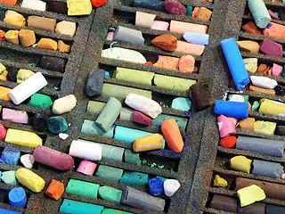 Image showing pastel colored crayons in a box