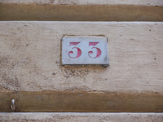 Image showing Red house number